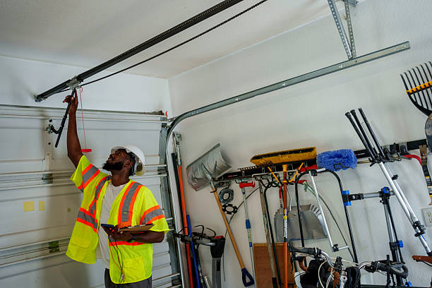 Professional Garage Door Panel Replacement technician working in Adelino, NM